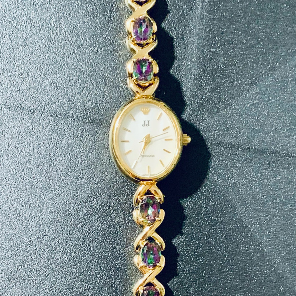 Gold Watch With Stainless Steel Back